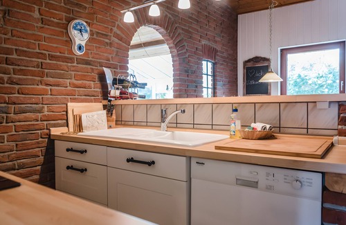 Langballigholz House | Holiday Home 'Hanghaus Am Meer' with Sea View, Private Terrace and Wi-Fi