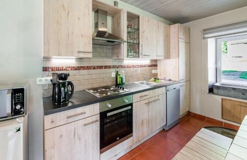 Nadrin House | Holiday Home in Houffaliz with Garden, cleaning included