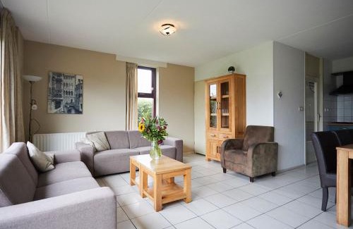 Heinkenszand House | Holiday Home in Zeeland with Garden