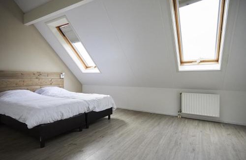 Heinkenszand House | Holiday Home in Zeeland with Garden