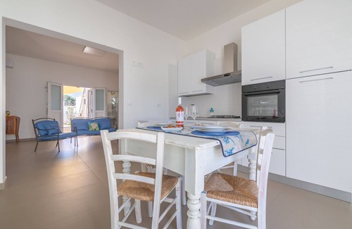 Punta Prosciutto Villa | Holiday home with veranda and parking near the sandy beach of Punta Prosciutto