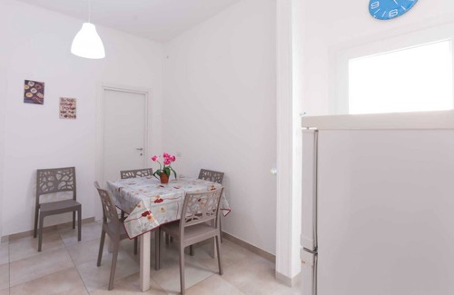 Porto Cesareo House | Holiday Home 'Luna Rossa' with Private Terrace, Wi-Fi and Air Conditioning