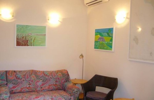 Giannella House | Holiday Home 'Residence Giannella - Robinia 35' with Private Garden and Air Conditioning