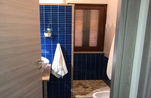 Budoni House | Holiday Home Sadomo De Rosa 2 close to the Beach with Shared Garden