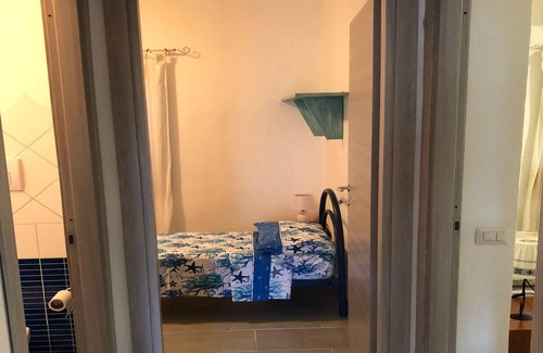 Budoni House | Holiday Home Sadomo De Rosa 2 close to the Beach with Shared Garden