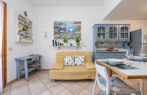 Porto Sa Ruxi House | Holiday Home "Villetta Anna a Porto Sa Ruxi" with Sea View, Shared Pool & Wi-Fi