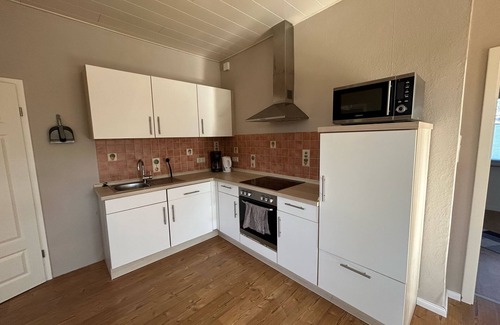 Ihlow House | Holiday Home 'Weißer Friese' with Private Terrace, Shared Garden and Wi-Fi