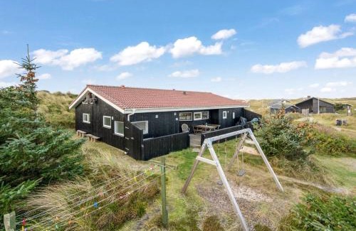 Houvig Strand House | Holiday Home Wighman - from the sea by Interhome