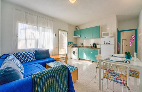 Los Delfines Apartment | HolidayApartment "Bonito Apartamento En Planta Baja Dm13" near Beach with Shared Pool & Wi-Fi