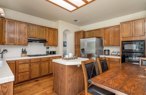 Clovis House | Home oasis with sauna, jacuzzi, pool & heated gazebo!