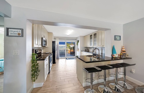 Melaleuca Gardens House | Home on Canal Unit B by PMI