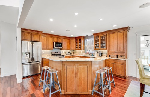 Malletts Bay House | Home on Lake Champlain with pool, hot tub, in-home gym, firepit, & lovely views