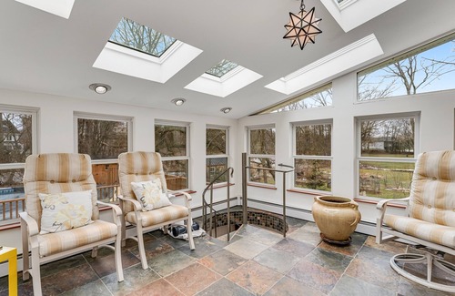 Malletts Bay House | Home on Lake Champlain with pool, hot tub, in-home gym, firepit, & lovely views