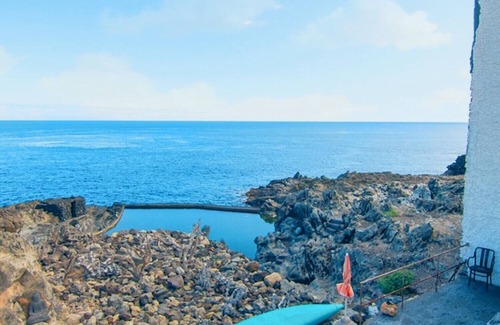 Arico Apartment | HomeForGuest NextDoor Oasis: ocean front, terrace, natural pool- HomeForGuest