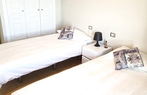 Poris de Abona Apartment | Homerez - Appartement 1 km away from the beach for 4 ppl. with shared pool