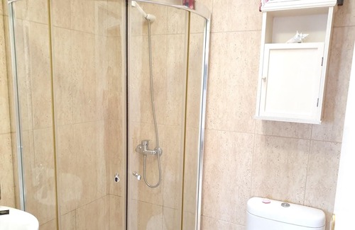Poris de Abona Apartment | Homerez - Appartement 1 km away from the beach for 4 ppl. with shared pool