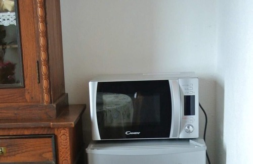Monticello Amiata Apartment | Homerez - Spacious apartment with garden and balcony