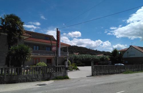 Tomino House | Hostal - Restaurante Casa Cuña