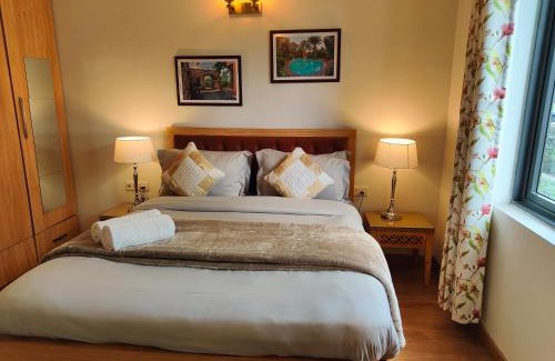 Sector 58 Apartment | Hostie Evanya - 2BHK Serviced Apartment near Golf Course Road