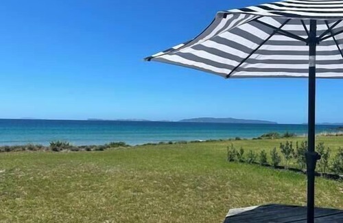 Matarangi House | Hosts on the Coast shimmering on the Shore