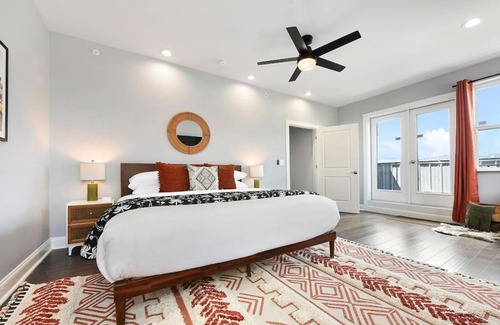 Lower Lawrenceville House | HostWise Stays - The Charlotte - Rooftop patio, Garage Parking, Prime Location, Large 3 Story Home