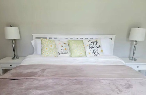 Conyers House | Hot tub & game room! 2 bed, 1.5 bath bsmt space