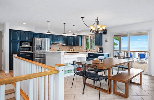Traverse City House | Hot Tub & West Bay Waterfront Sunrises - All Decked Out