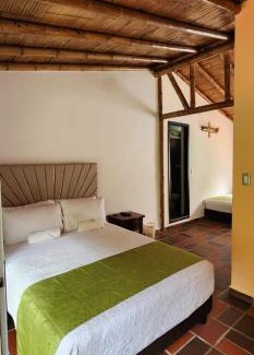 Zetaquira Hotel | Hotel y termales Las Heliconias