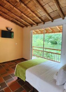 Zetaquira Hotel | Hotel y termales Las Heliconias