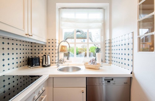 Keitum Apartment | House Alster, Whg. 1 - thatched. Watt. Feel good.