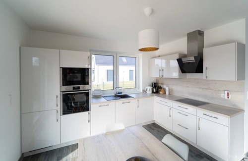 Barssel House | House LIBELLE on Harkebrügger See with sauna and fireplace - new building