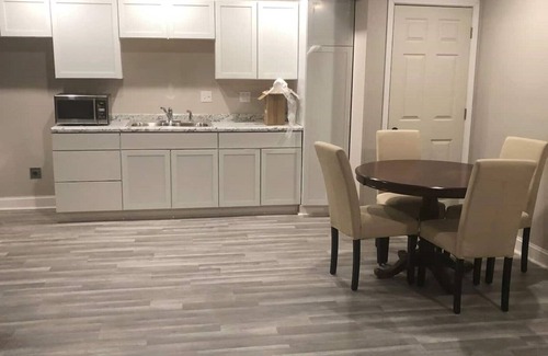 Lawrence House | House with walkout rooms to the yard. All new appliances