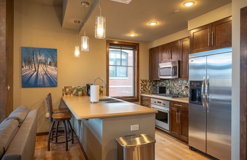 Downtown Steamboat Springs Condo | Howelsen Place A302 | Downtown Condo | Private Parking Garage | Fire Pit with Views