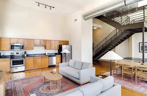 Downtown Louisville Apartment | Huge Corner Loft in Historic Whiskey Row Lofts