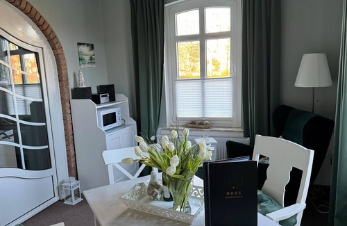 Westeraccumersiel Apartment | Huus Achterdiek - Erdgeschosswohnung "anker" mit Freundlicher Atmosphäre