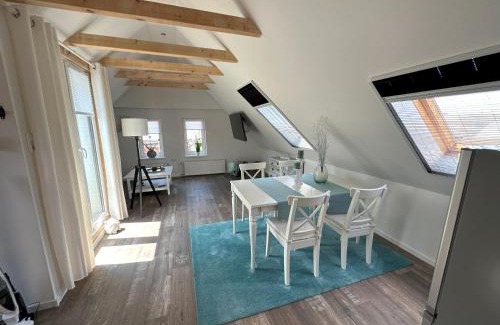 Reithamm Apartment | Huus an`t Koornfeld Dachgeschosswohnung mit Loggia