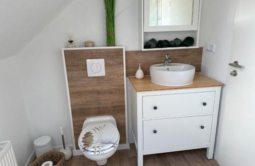 Reithamm Apartment | Huus an`t Koornfeld Dachgeschosswohnung mit Loggia