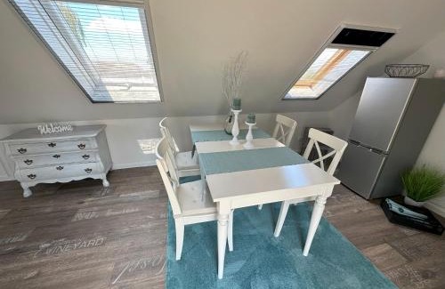 Reithamm Apartment | Huus an`t Koornfeld Dachgeschosswohnung mit Loggia