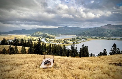Harrison Cabin | Idaho Getaways Beautiful Glamp tent with lakeview of Lake Coeurdalene & campfire