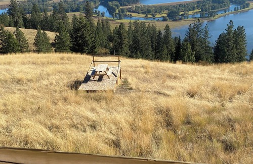 Harrison Cabin | Idaho Getaways Beautiful Glamp tent with lakeview of Lake Coeurdalene & campfire
