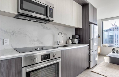 Seaport District Apartment | Ideal Seaport Studio w/Gym, Pool, W/D, Doorman