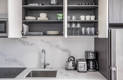 Seaport District Apartment | Ideal Seaport Studio w/Gym, Pool, W/D, Doorman