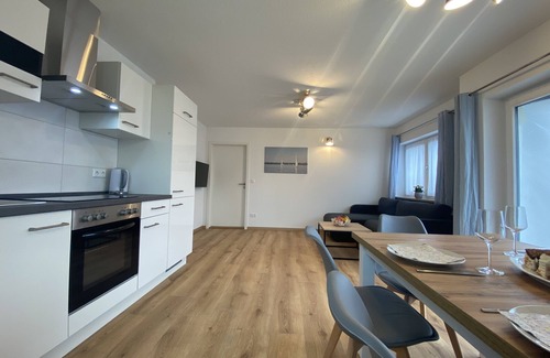 Motzach Apartment | Idyllic apartment in the countryside with south-facing balcony, parking space (wallbox) and bicycle room.