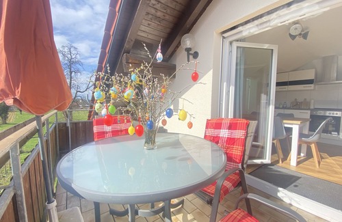 Motzach Apartment | Idyllic apartment in the countryside with south-facing balcony, parking space (wallbox) and bicycle room.