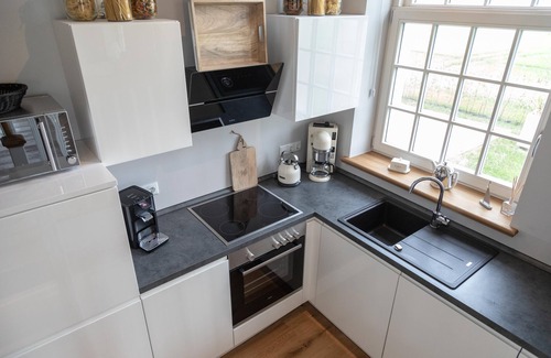 Dornum Apartment | "Idyllic vacation apartment in Neßmersiel: experience relaxation, beach & sea!"