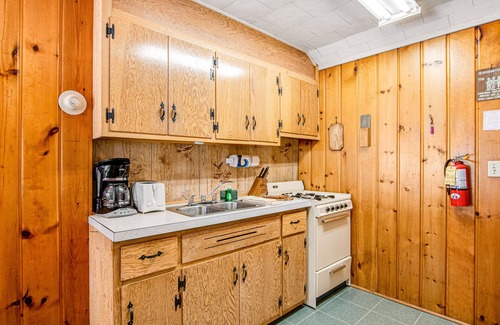 Conover Cabin | Idyllic waterfront cabin at Scott’s Twin Lake Resort with swimming beach & docks