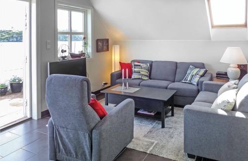 Austevoll House | Idyllically located awaits you this charming cottage and its terrace.