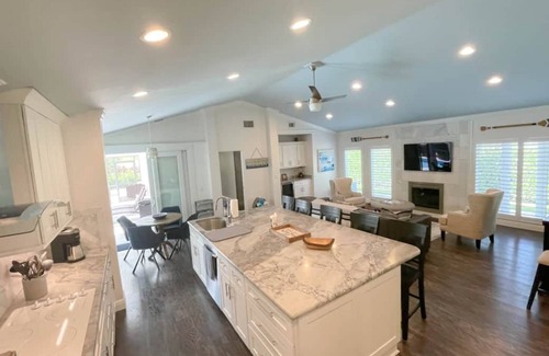 Palm River Estates House | Immaculately maintained 4 bd 3 ba home feat private pool on LaPlaya golf course.