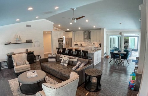 Palm River Estates House | Immaculately maintained 4 bd 3 ba home feat private pool on LaPlaya golf course.