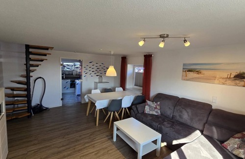 Dornumergrode Apartment | In a quiet residential area + fenced garden + free WiFi + by the sea + dogs welcome + modern furnishings